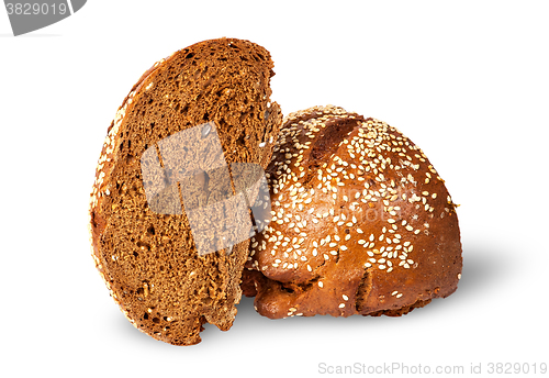 Image of Two halves of rye bread with sesame seeds