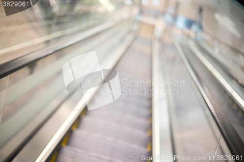 Image of Escalator blur background with bokeh