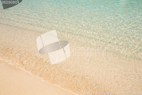 Image of Wave of the sea on the sand beach