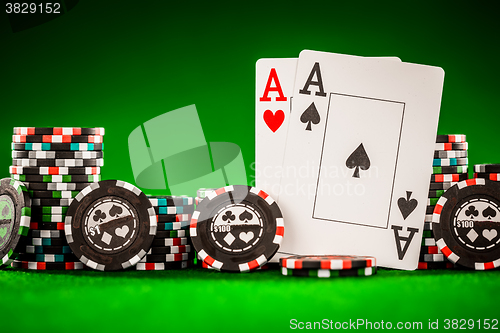 Image of chips and two aces