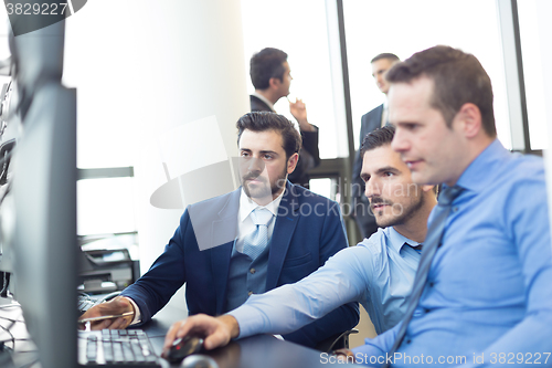 Image of Business team working in corporate office.