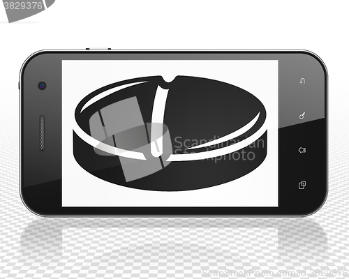 Image of Medicine concept: Smartphone with Pill on display