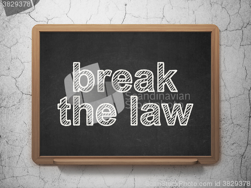 Image of Law concept: Break The Law on chalkboard background
