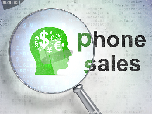 Image of Advertising concept: Head With Finance Symbol and Phone Sales with optical glass