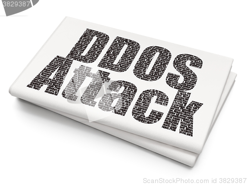 Image of Protection concept: DDOS Attack on Blank Newspaper background