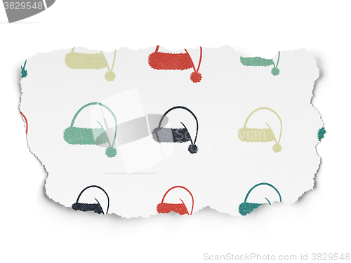 Image of Entertainment, concept: Christmas Hat icons on Torn Paper background