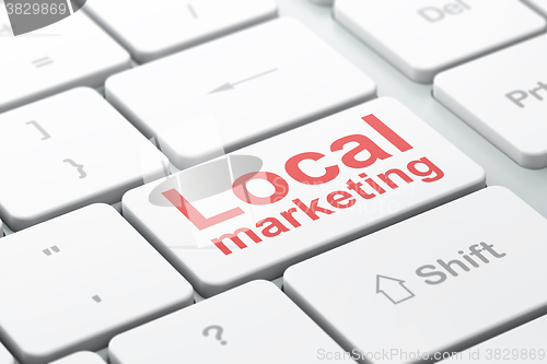 Image of Advertising concept: Local Marketing on computer keyboard background