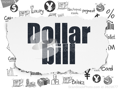 Image of Money concept: Dollar Bill on Torn Paper background