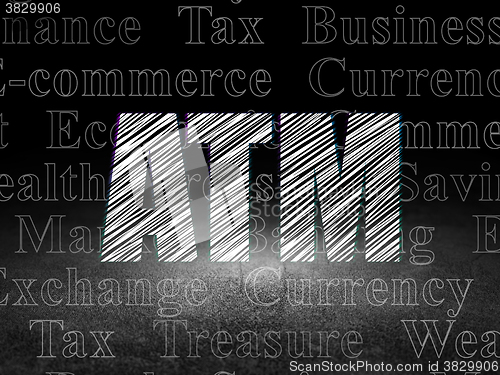 Image of Money concept: ATM in grunge dark room