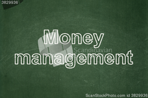 Image of Money concept: Money Management on chalkboard background