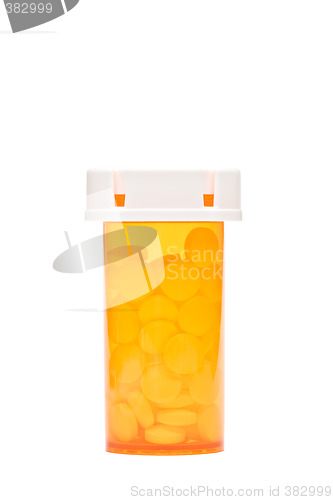 Image of pills in bottle isolated