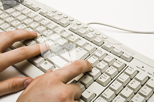 Image of Hand on keyboard