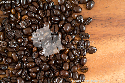 Image of Coffee on grunge wooden background