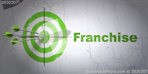Image of Finance concept: target and Franchise on wall background