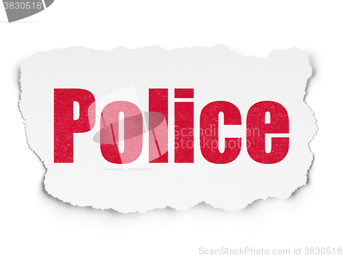 Image of Law concept: Police on Torn Paper background