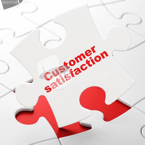 Image of Advertising concept: Customer Satisfaction on puzzle background