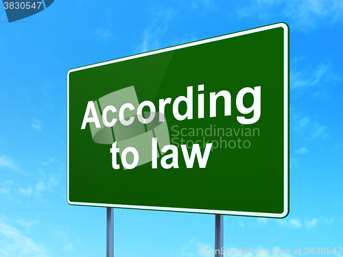 Image of Law concept: According To Law on road sign background