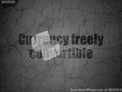 Image of Currency concept: Currency freely Convertible on grunge wall background