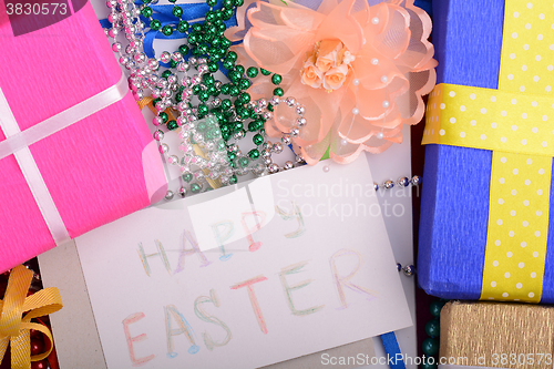 Image of Easter background with eggs, ribbons and spring decoration