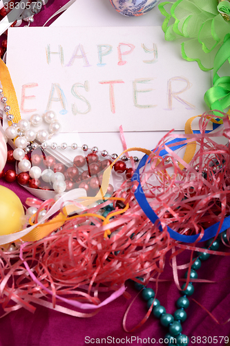 Image of Easter background with eggs, ribbons and spring decoration