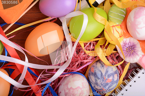 Image of hand made eggs at a gift box, happy easter invitation card