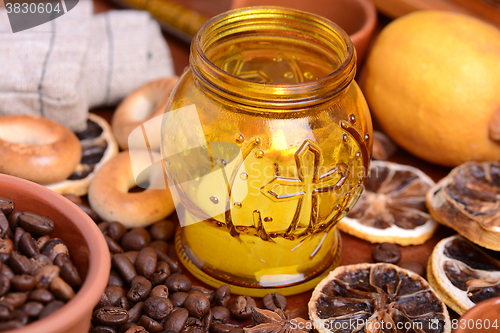 Image of coffee beans and candle lemon on old vintage background
