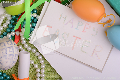 Image of Easter background with Easter eggs with spring flowers/ vintage easter card with basket