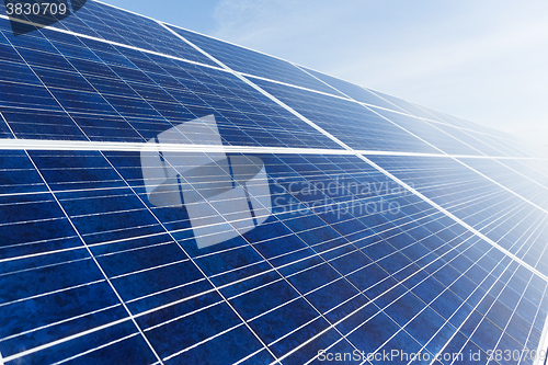 Image of Solar energy panel with blue sky