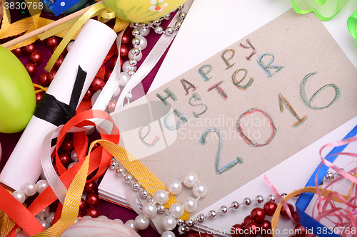Image of Easter background with eggs, ribbons and spring decoration