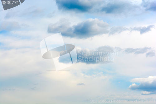 Image of Fantastic soft white clouds against blue sky