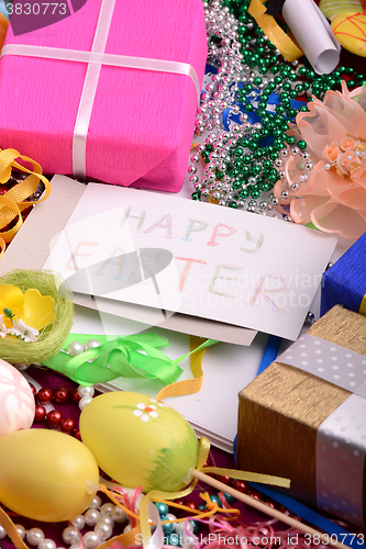 Image of Easter background with eggs, ribbons and spring decoration