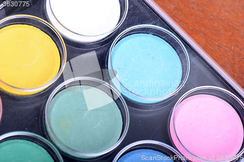 Image of watercolor paints palette close up