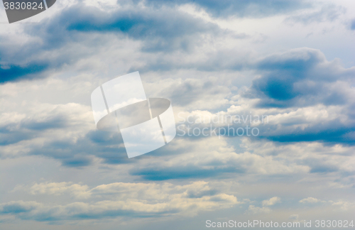 Image of blue sky background with tiny clouds