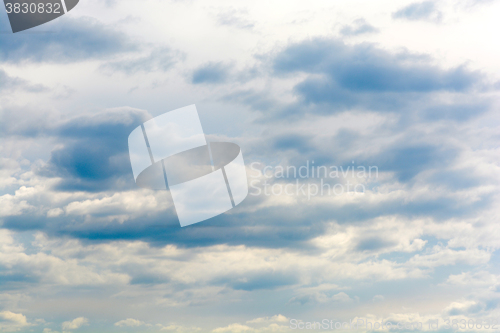Image of Fantastic soft white clouds against blue sky