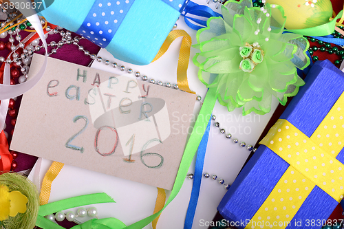 Image of Easter background with eggs, ribbons and spring decoration