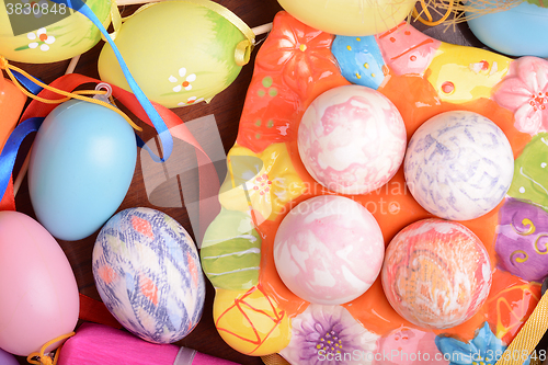 Image of Easter background with eggs, ribbons and spring decoration