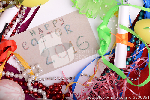 Image of Easter background with eggs, ribbons and spring decoration