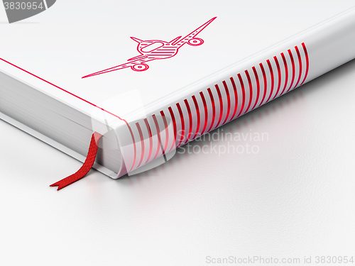 Image of Travel concept: closed book, Aircraft on white background