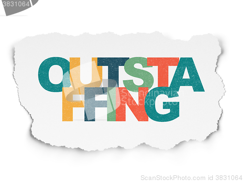 Image of Finance concept: Outstaffing on Torn Paper background