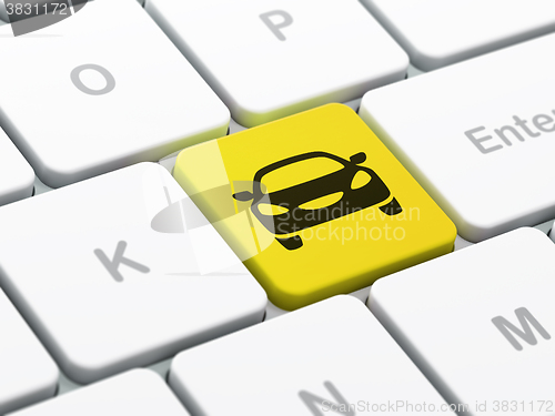 Image of Travel concept: Car on computer keyboard background