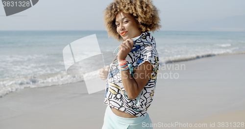 Image of Woman Having Fun On The Beach