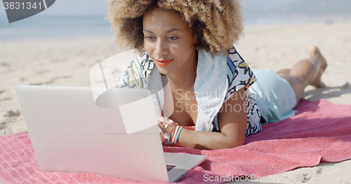 Image of Young Girl Using Computer