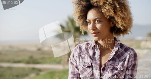 Image of Woman With Happy Expression Relaxing On Nature