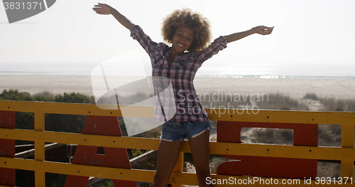Image of Young Girl Spreading Hands And Joy