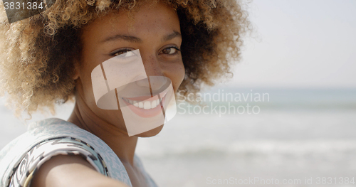 Image of Young Girl Beckoning To Come