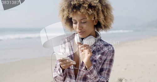 Image of Gorgeous Girl Listening To Music