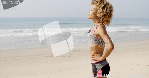 Image of A Young Girl At The Beach.