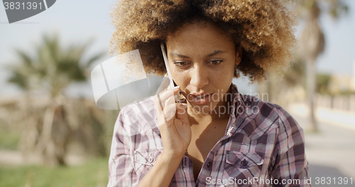 Image of Smiling Woman Talking On Cell Phone