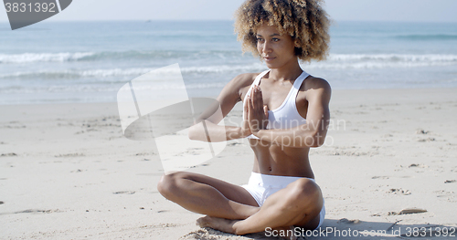 Image of Serene Relaxed Female Yoga Instructor