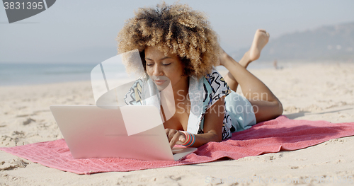 Image of Young Girl Using Computer
